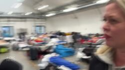 See inside a temporary structure home for dozens in need of shelter News Clip