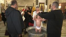 Five hundred infants baptized in a single ceremony Instructional Video
