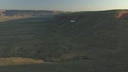 Small aircraft flying over the Kimberley lowlands, Western Australia Stock Footage