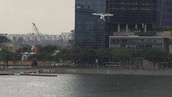 CLEAN : Hover-taxi flies over Singapore firm eyes Asian push News Clip
