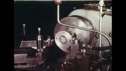 YOUNG MAN IN REINDEER SWEATER AND WOMAN WATCH. BOYS PLAY FOOTBALL. Stock Footage