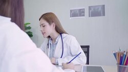 Professional Asian doctor medical professionals team brainstorming in a meeting. Team of healthcare workers discussing in boardroom at hospital. Health care and assistance concept. Stock Footage