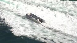 UK Border Force boat towing an empty migrant raft News Clip