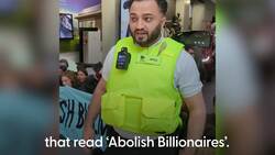 Climate protesters dragged from Tesla showroom as campaigners target Elon Musk News Clip