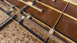 Aerial view to sewage treatment plant. Grey water recycling. Waste management theme. Stock Footage