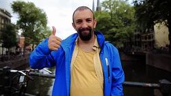 Portrait of an Adult Man giving thumbs up, Outdoor Stock Footage