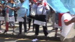 CLEAN : Peruvians protest as electoral body discusses ban on candidate pledging to donate salary News Clip