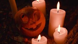 large and small pumpkins with carved faces. Halloween. Stock Footage