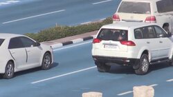 CLEAN : Feeling blue: Qatar road turned azure to cool city News Clip