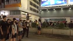 A line of protesters on the street in Hong Kong News Clip