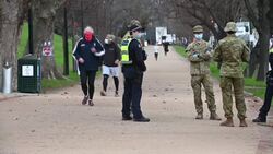 CLEAN : Coronavirus: Police and soldiers patrol running track in Melbourne News Clip