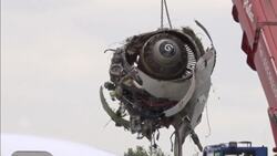 Cargo plane skids off runway during landing in Italy News Clip