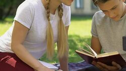 Teenage girl trying to kiss classmate, boy refuses, adolescence and hormones Stock Footage
