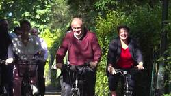 Ed Davey arrives by bicycle for the Liberal Democrat conference News Clip