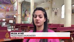 Christmas returns to Gaza City: Children decorate church for first time in two years News Clip