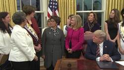 Trump signs act for Women's Suffrage coin News Clip