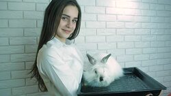 Girl with a white bunny. Stock Footage