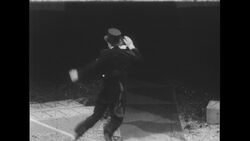 United States, 1950s: Clown with movie camera Stock Footage