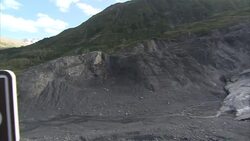 Views of a Glacier and Mountains in Kenai Fjords National Park News Clip