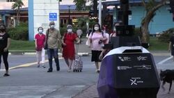 VOICED : Robots patrulleros despiertan temores en Singapur News Clip