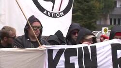 People on street taking part in anti-fascist and anti- far right protest News Clip