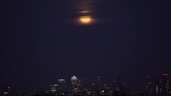 Final supermoon of the year appears over Canary Wharf News Clip