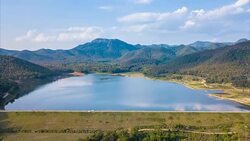 Aerial View Over Wind Dam 4K Time Lapse (tilt down) Stock Footage