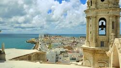 Wide Angle: Looking at Ocean and City From a Church Stock Footage