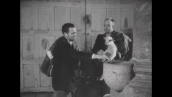 Spanish villagers in church on Christmas morning, one with lamb News Clip