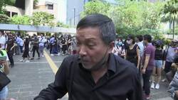 HKG protesters rally against possible mask ban Instructional Video