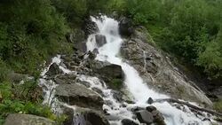 View waterfall scenes in mountains, national park Dombai, Caucasus, Russia Stock Footage