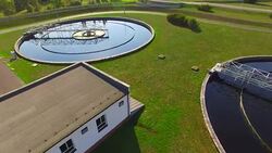 Aerial view to sewage treatment plant. Grey water recycling. Waste management theme. Stock Footage