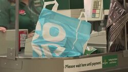 Plastic bag at a checkout News Clip
