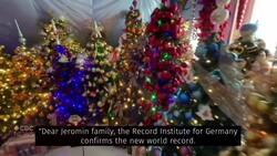 One house. Hundreds of Christmas trees. News Clip