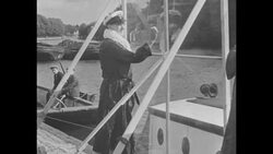 Daredevil dives through pane of glass in England, 1932 News Clip