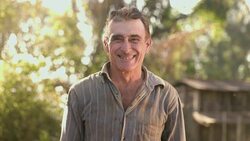 Middle aged farmer on farmland Stock Footage