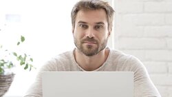 Serious Man Looking at Camera at Work Stock Footage