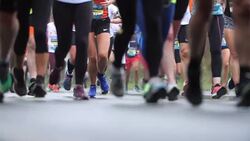 City marathon runners in slow motion Stock Footage
