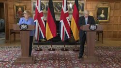 Angela Merkel and Boris Johnson speaking at joint press conference News Clip