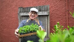 Portrait of Farmer Holding Plants Stock Footage