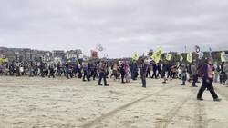 Extinction Rebellion demonstrate on Cornish beach News Clip