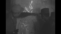 During Korean War, US and South Korean officers examine map during Battle of Bloody Ridge in North Korea News Clip