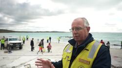 Volunteers help 45 whales reach deeper waters after getting stranded on Australian beach Instructional Video