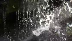 Splashing water in slow motion 180fps Stock Footage