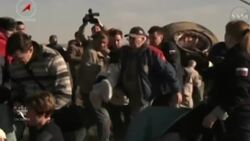 Astronauts safely home from space station jaunt News Clip