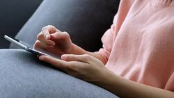 Woman hand using digital tablet while sitting on sofa, People on phone, lifestyles Stock Footage