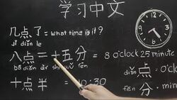 Learning chinese to tell time in class room. Stock Footage