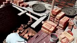 Bricklayer installing bricks on construction site Stock Footage