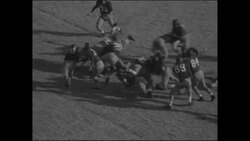 Southern Methodist University beats Arkansas 21-14 in 1954 college football action News Clip