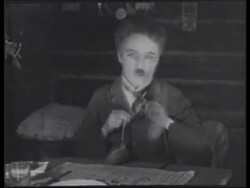 Scenes from Charlie Chaplin's 'The Gold Rush', Buster Keaton in 'The Genera'l and Harold Lloyd hanging from the clock in 'Safety Last', 1920s Stock Footage